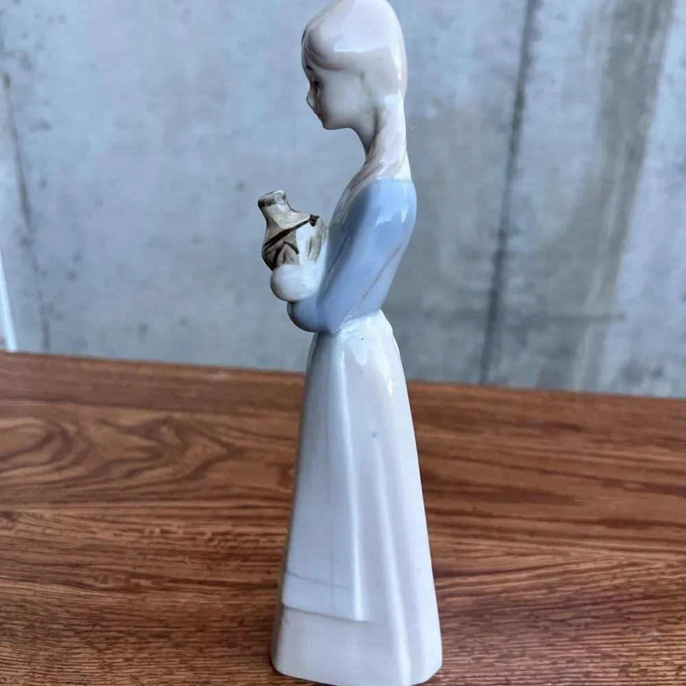 Porcelain Pheasant Lady Holding A Jug Good Condition